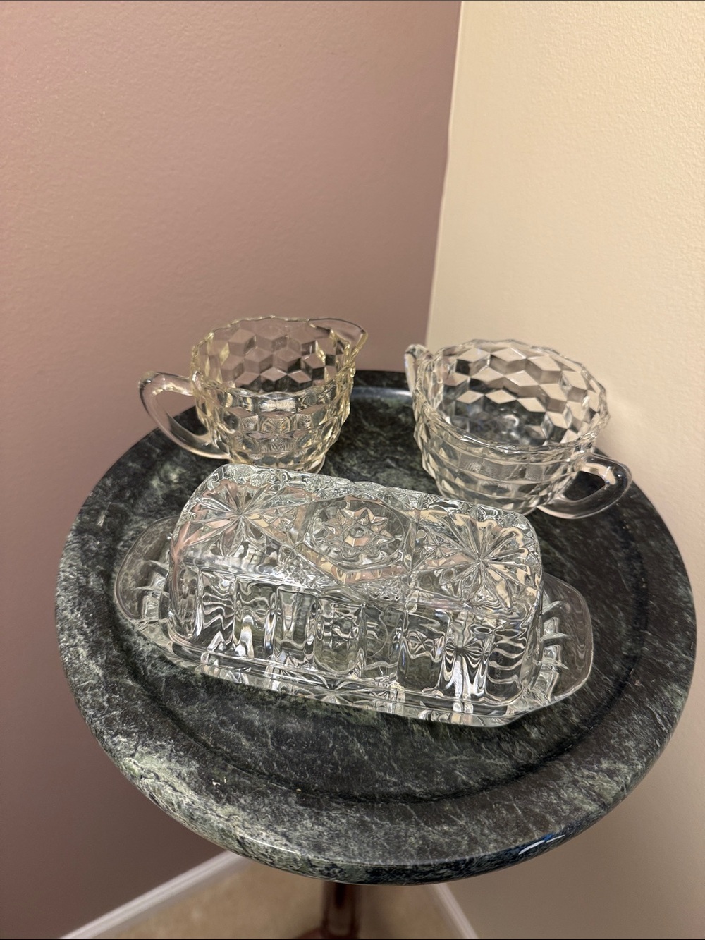 Pressed glass butter dish with cream and sugar